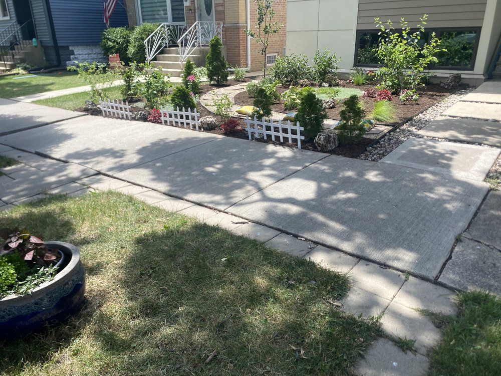 Front yard walkway with garden beds
